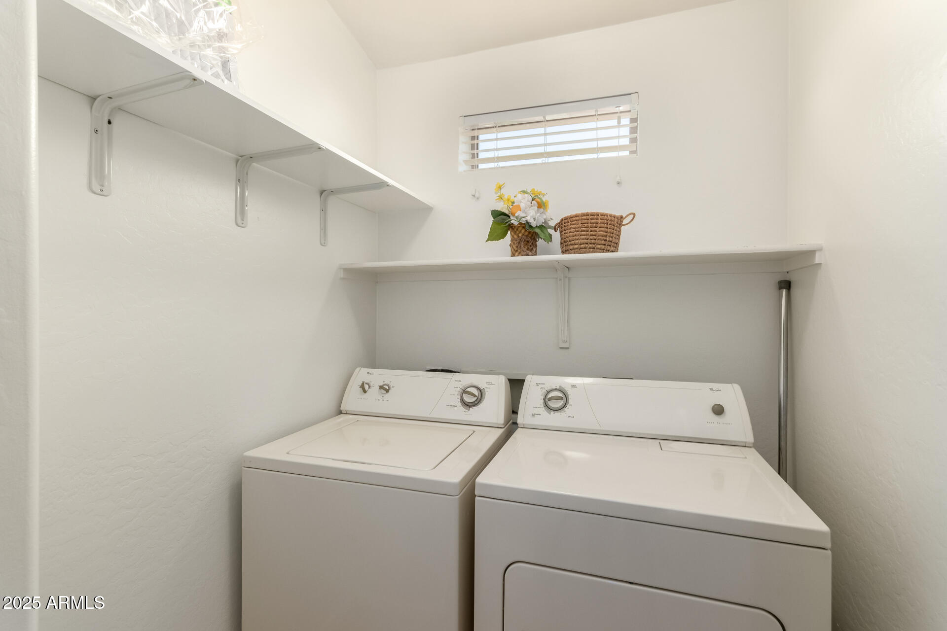 16620 South 48th Street, Unit 70 Phoenix, AZ 85048 - Photo 28 of 36 a utility room with dryer and washer