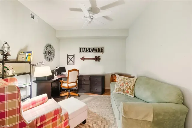 a bedroom with a workspace