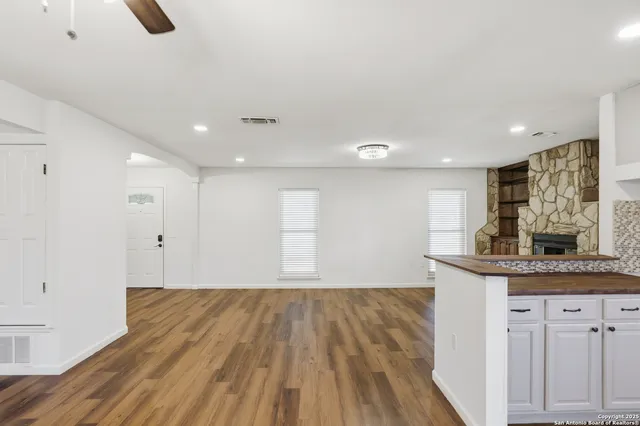 a view of kitchen with wooden floor