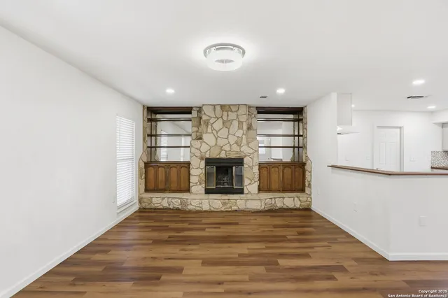a view of a livingroom with a fireplace