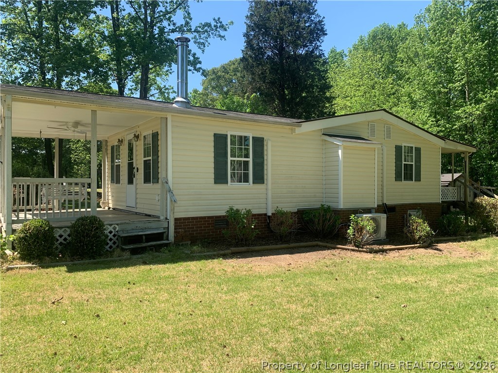1451 Deep River Road Sanford, NC 27330 - Photo 2 of 16 SIDE VIEW