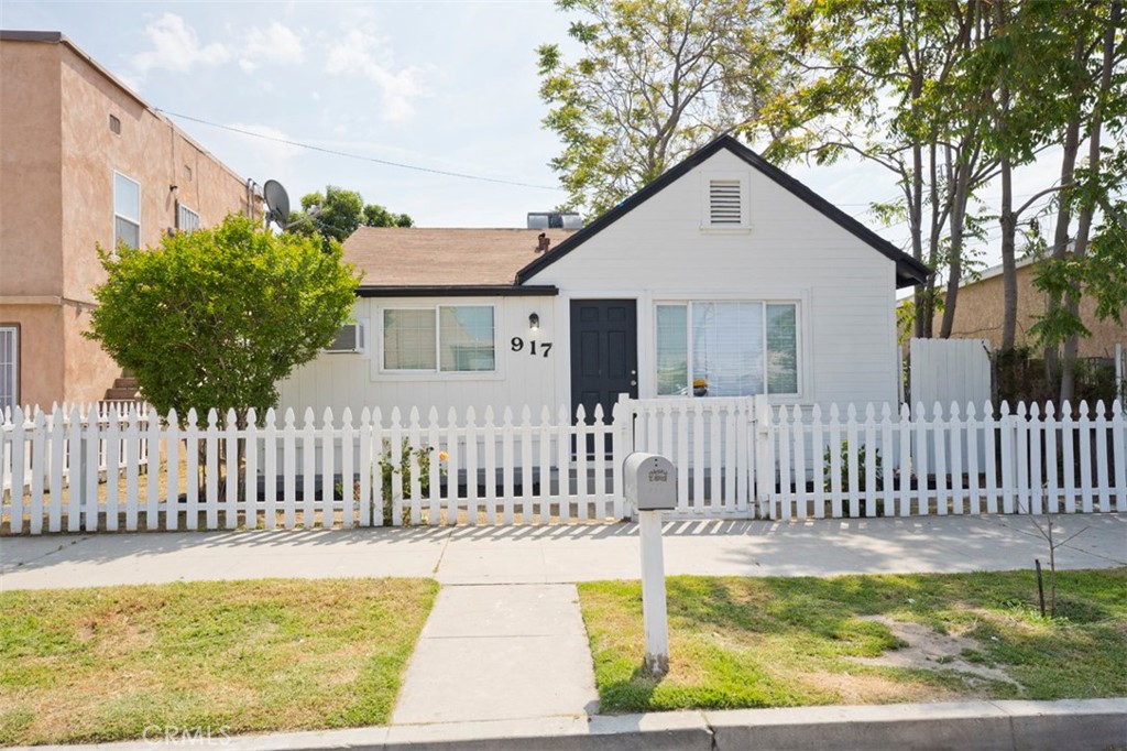 a front view of a house having yard
