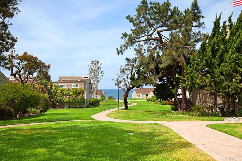 1856 Parliament Road Encinitas, CA 92024 - Photo 34 of 42 a garden view with a fountain