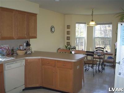 145 Little Twig Road Effort, PA 18330 - Photo 4 of 8 a kitchen with a sink cabinets and window