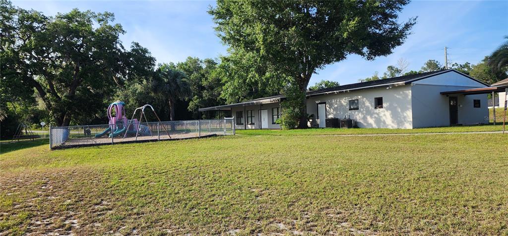 Tbd Southwest Viburnum Road Dunnellon, FL 34431 - Photo 17 of 25 a house view with swimming pool in front of it
