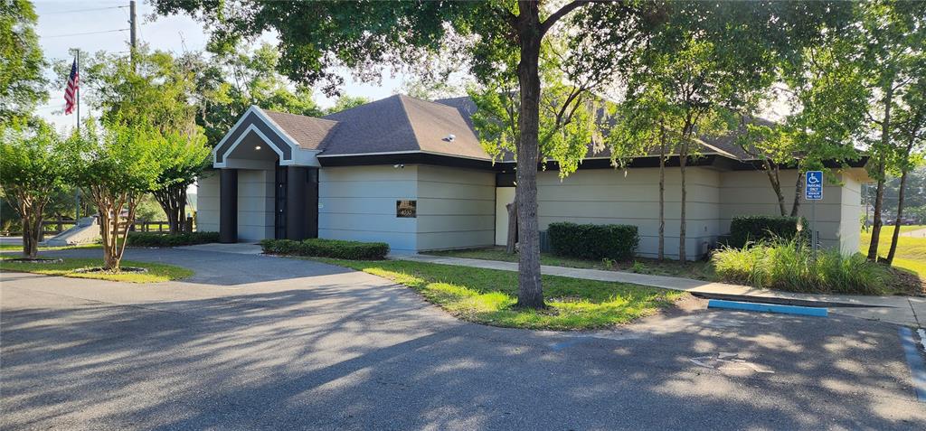 Tbd Southwest Viburnum Road Dunnellon, FL 34431 - Photo 23 of 25 a front view of a house with a yard and garage