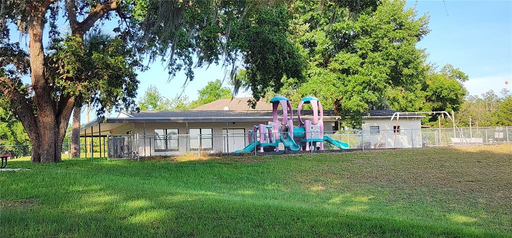 Tbd Southwest Viburnum Road Dunnellon, FL 34431 - Photo 9 of 25 front view of a house with a yard
