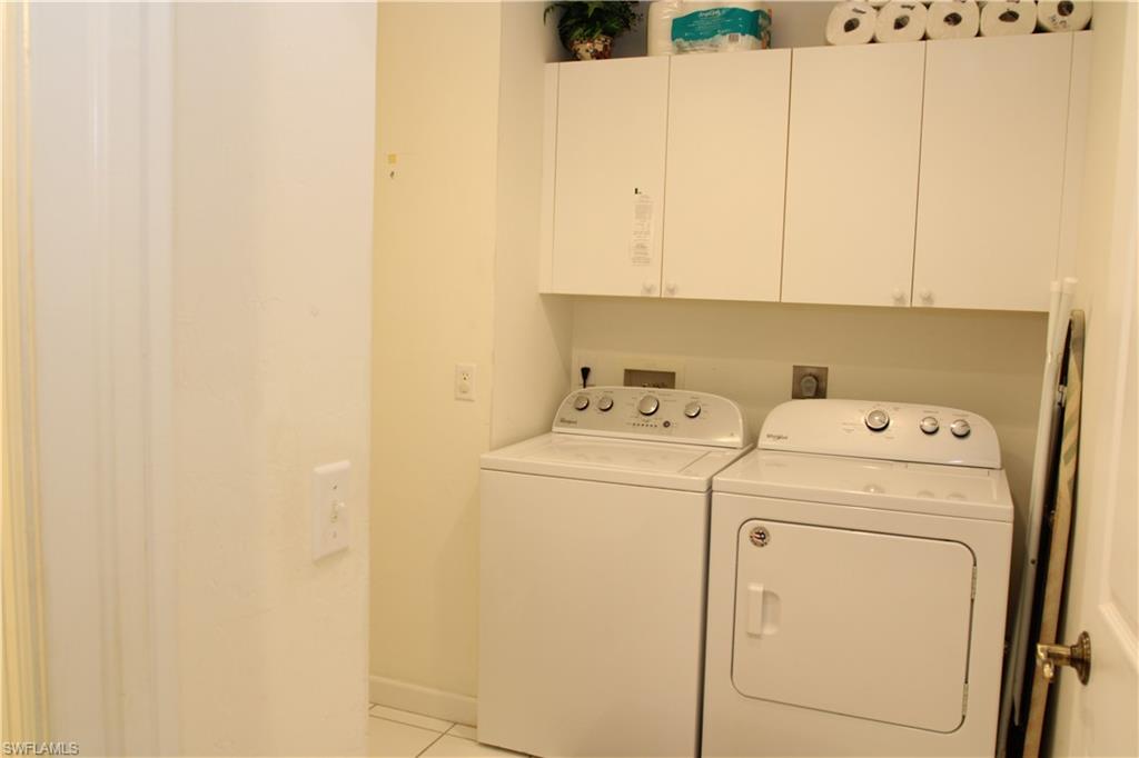 6660 Beach Resort Drive, Unit 1005 Naples, FL 34114 - Photo 21 of 38 a utility room with dryer and washer