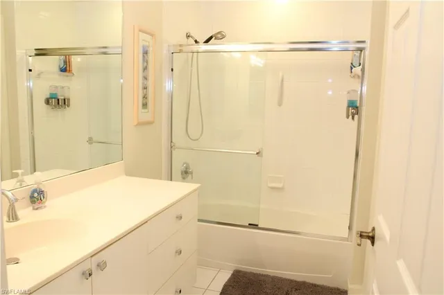 a bathroom with a shower and a toilet