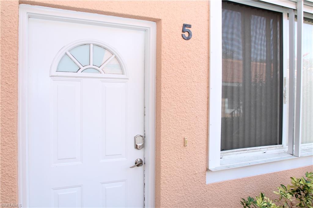 6660 Beach Resort Drive, Unit 1005 Naples, FL 34114 - Photo 32 of 38 a view of front door