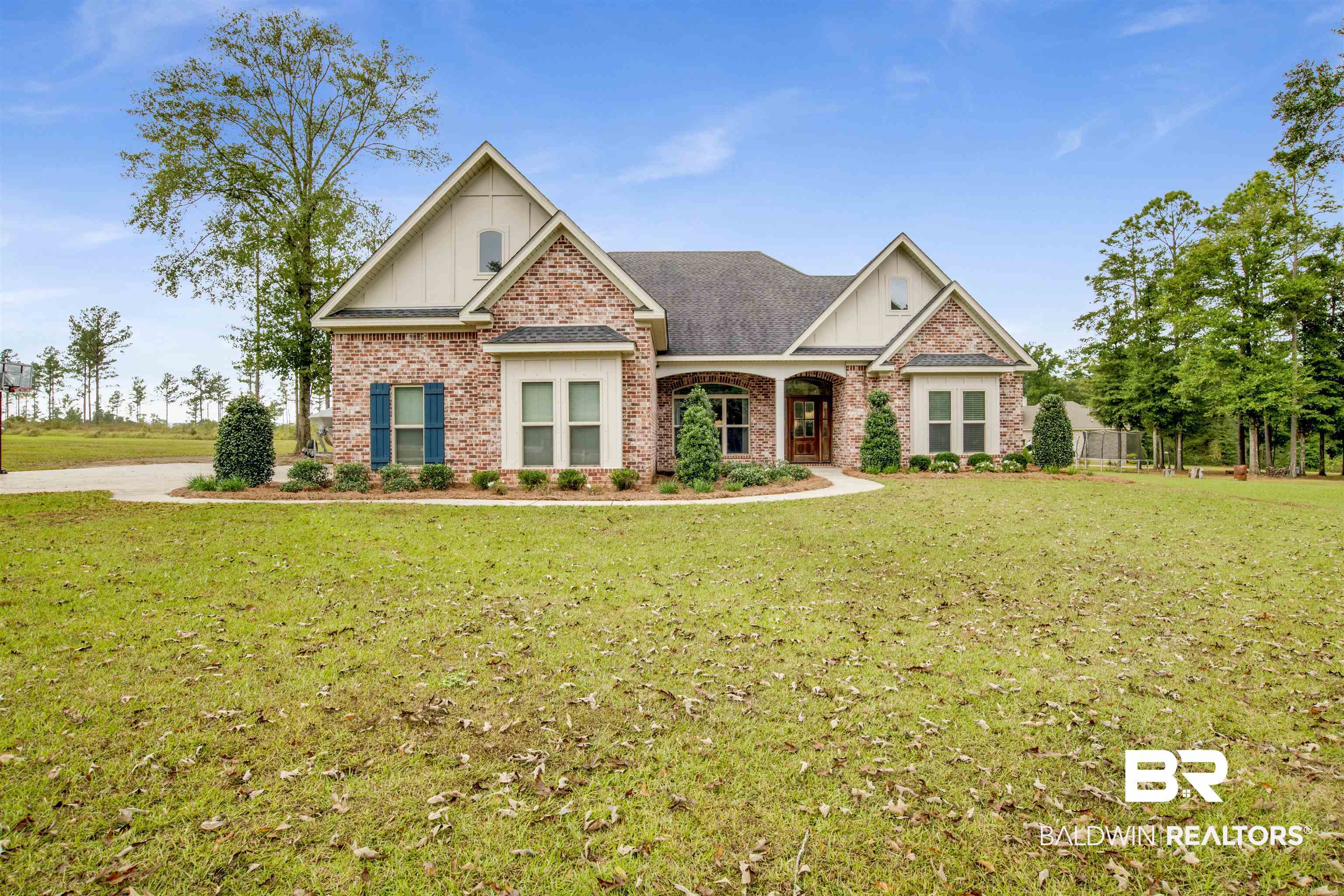 2440 Johnson Road West Mobile, AL 36695 - Photo 1 of 40 Craftsman house featuring a front lawn