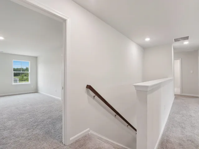 a view of hallway with stairs