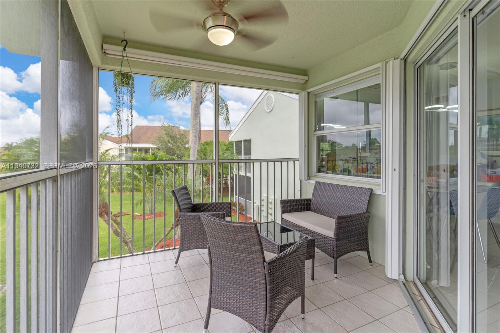 2520 Southeast 20th Place, Unit 204B Homestead, FL 33035 - Photo 23 of 45 a view of a room with furniture and balcony