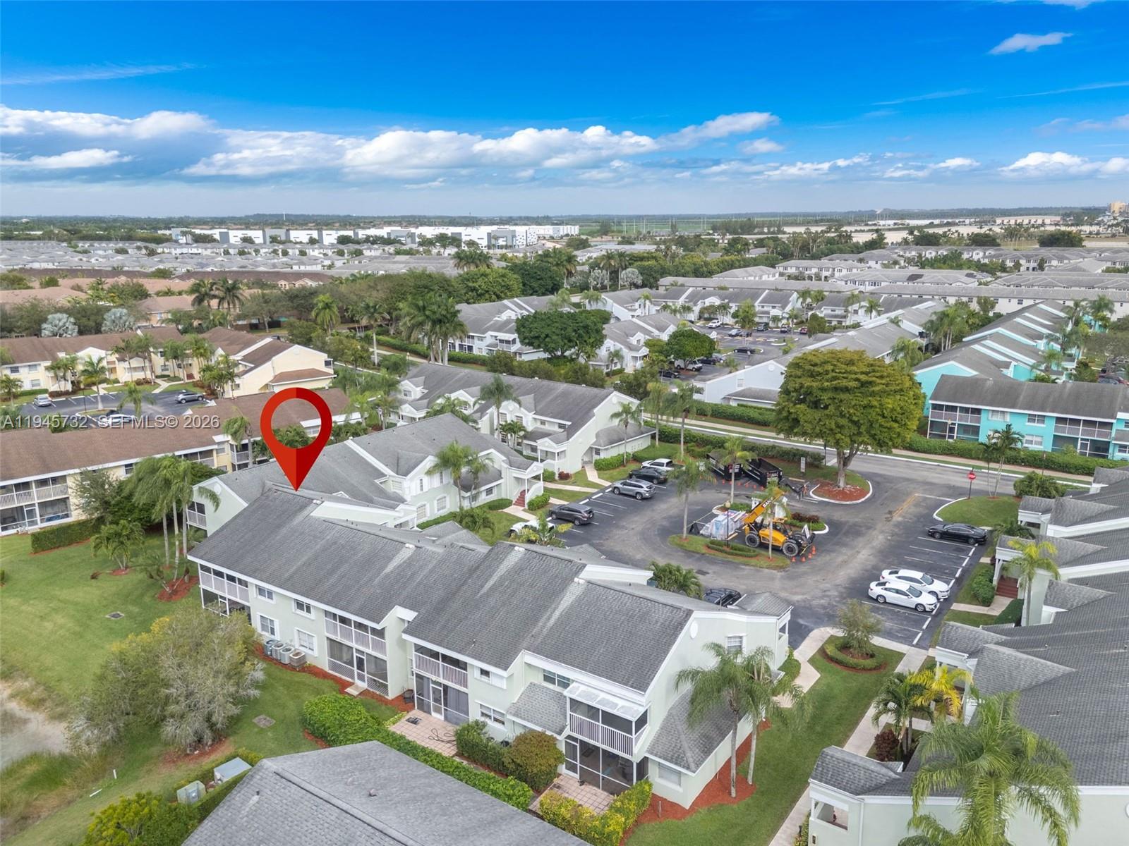 2520 Southeast 20th Place, Unit 204B Homestead, FL 33035 - Photo 27 of 45 an aerial view of swimming pool and mountain view in back