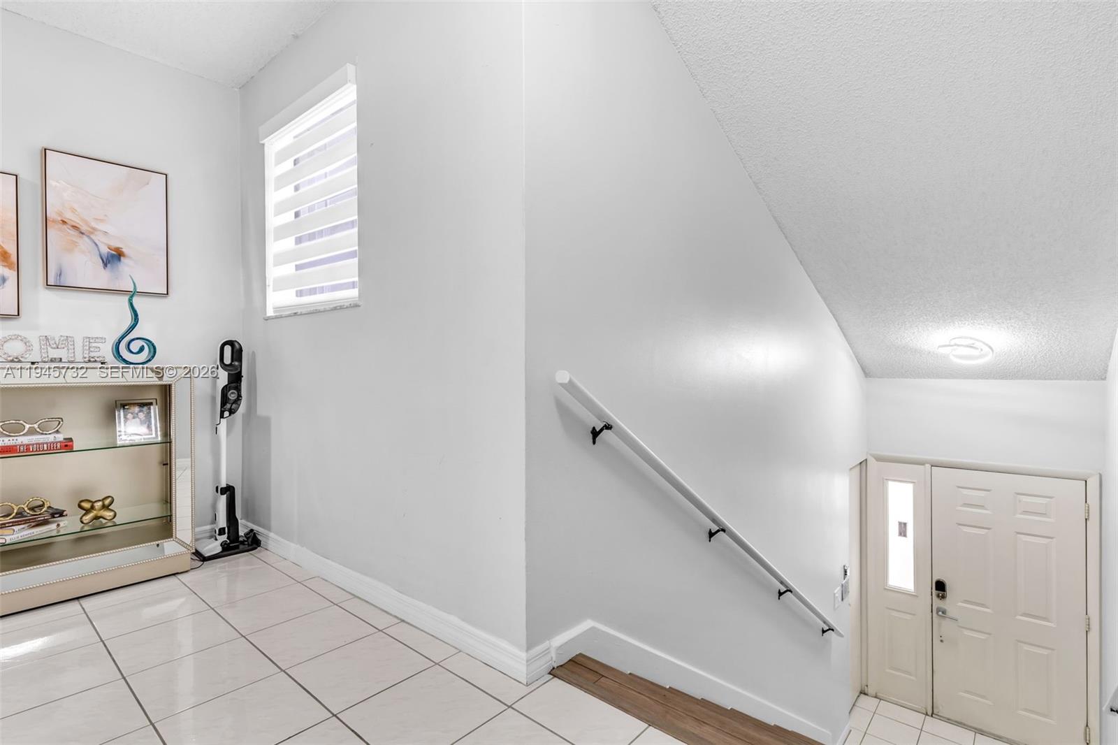 2520 Southeast 20th Place, Unit 204B Homestead, FL 33035 - Photo 3 of 45 a view of an empty room and workspace