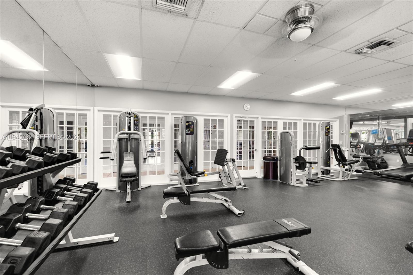 2520 Southeast 20th Place, Unit 204B Homestead, FL 33035 - Photo 34 of 45 a view of a room with gym equipment