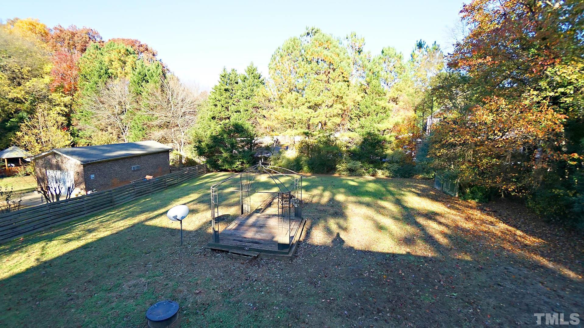 406 Snelling Road Raleigh, NC 27609 - Photo 21 of 22 Deck overlooking large backyard.