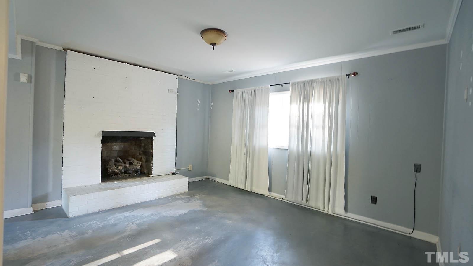 Updated kitchen with tile flooring stainless appliances, tile backsplash and granite counter tops.