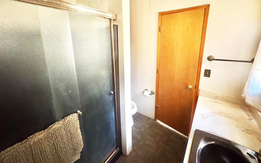 6330 Caldor Road Somerset, CA 95684 - Photo 21 of 30 a view of bathroom with shower and wooden floor