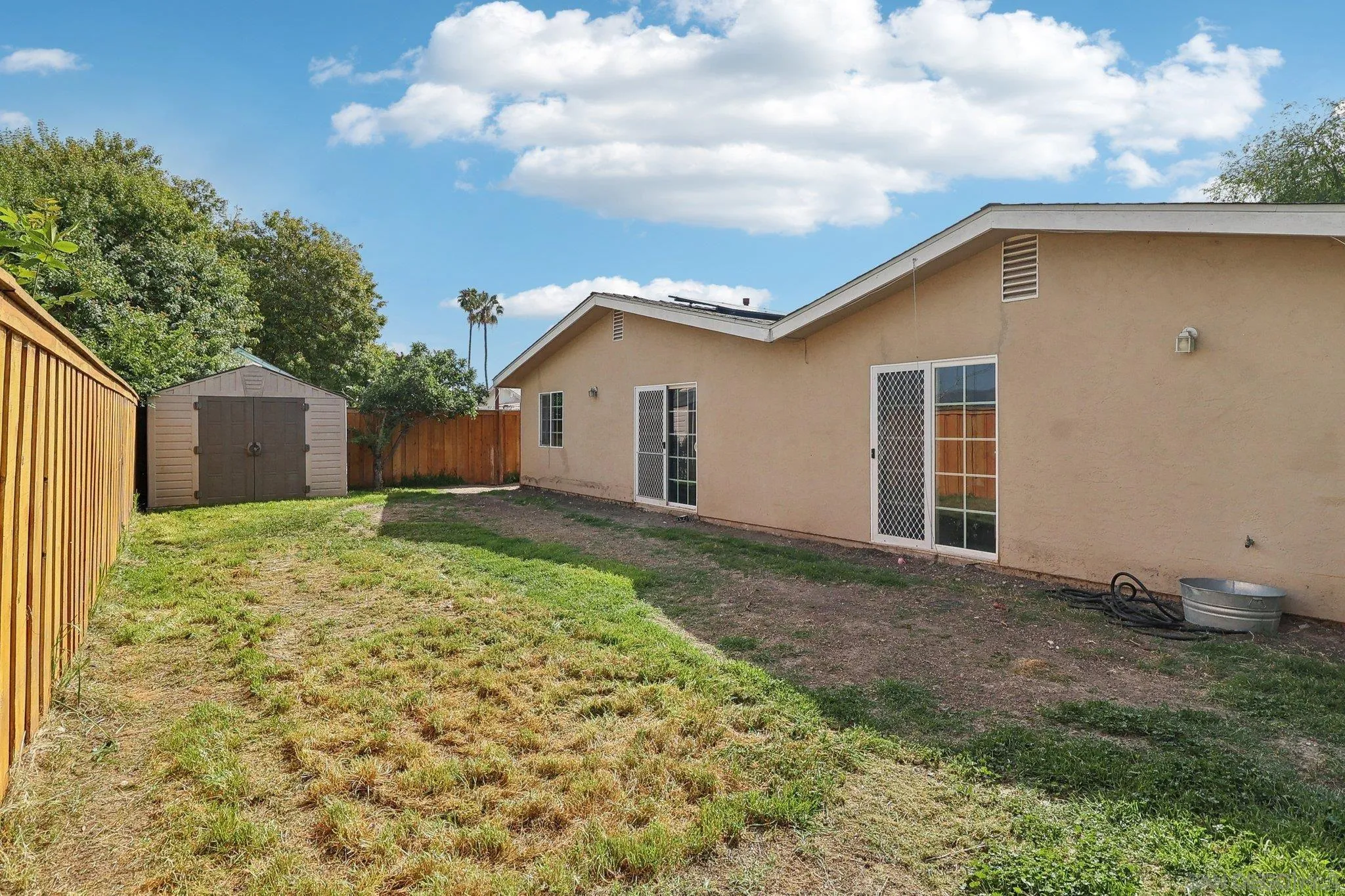 1673 Walbollen Street Spring Valley, CA 91977 - Photo 17 of 21 a view of a house with backyard