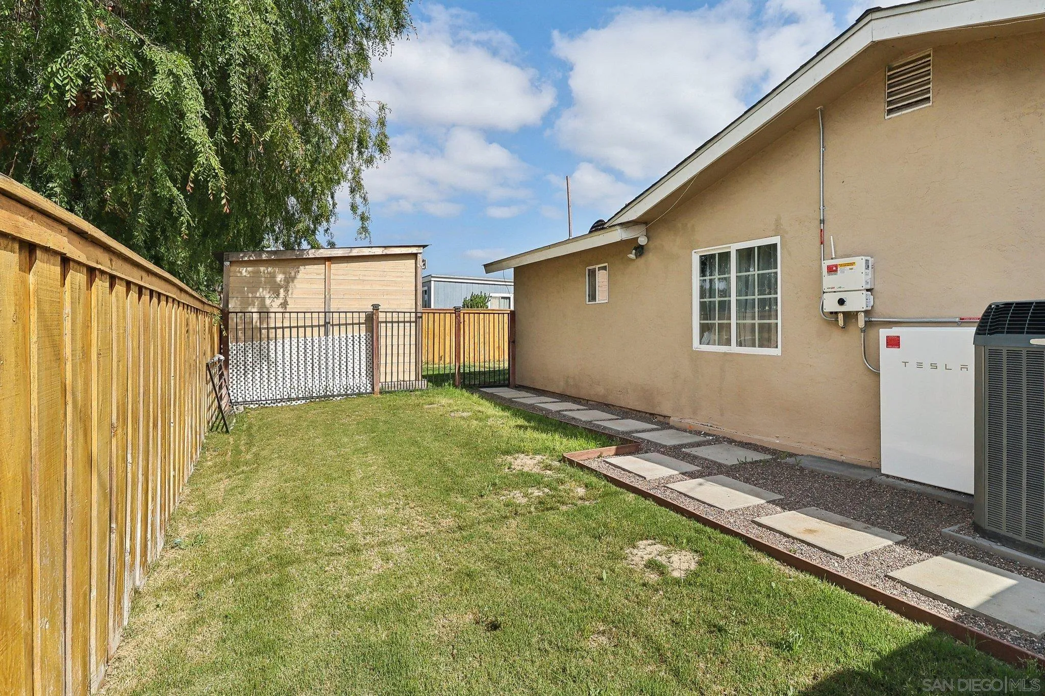 1673 Walbollen Street Spring Valley, CA 91977 - Photo 18 of 21 a backyard of a house