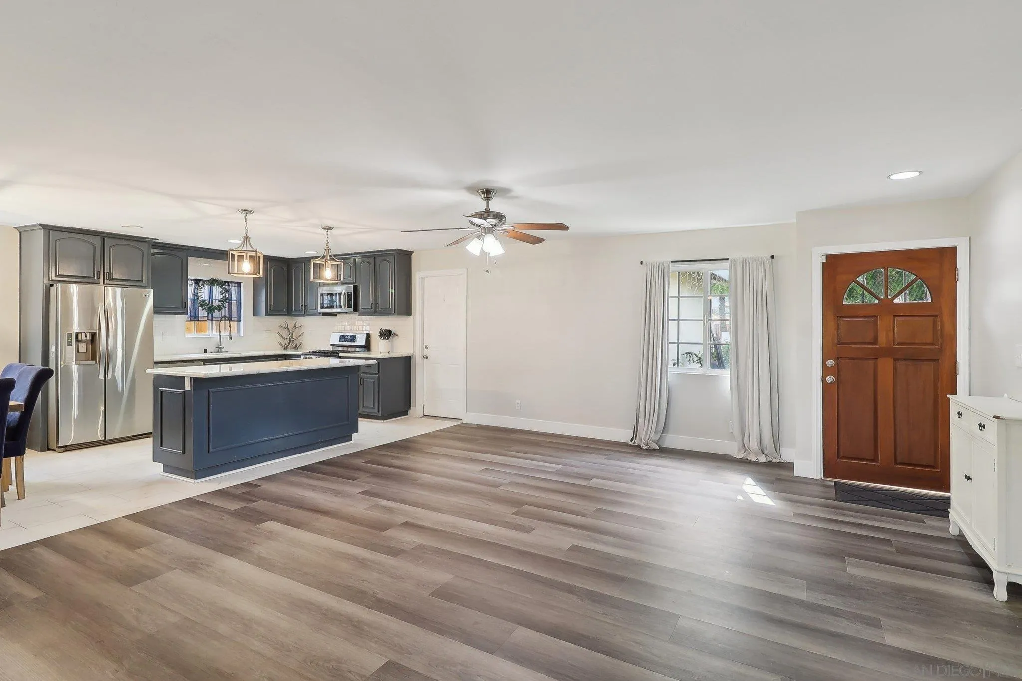 1673 Walbollen Street Spring Valley, CA 91977 - Photo 2 of 21 a view of kitchen with cabinets and stainless steel appliances