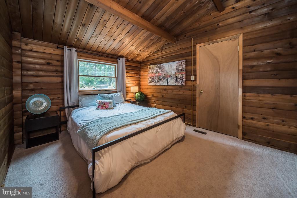12550 Rousby Hall Road Lusby, MD 20657 - Photo 14 of 30 Enjoy relaxing main level bedroom 1