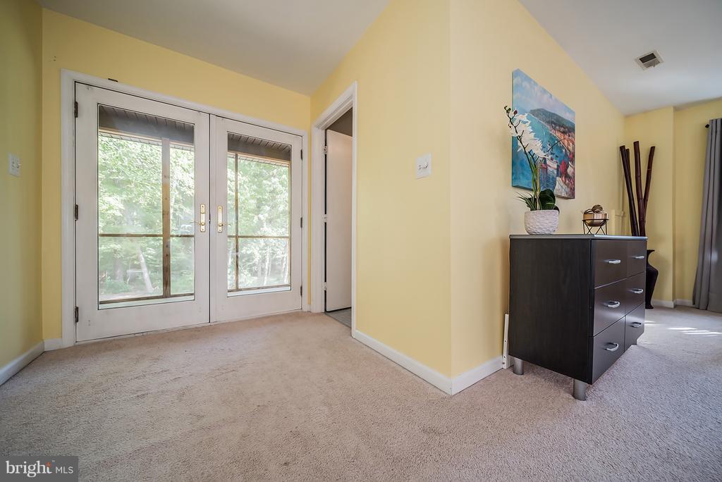 12550 Rousby Hall Road Lusby, MD 20657 - Photo 22 of 30 Private access to screened in balcony