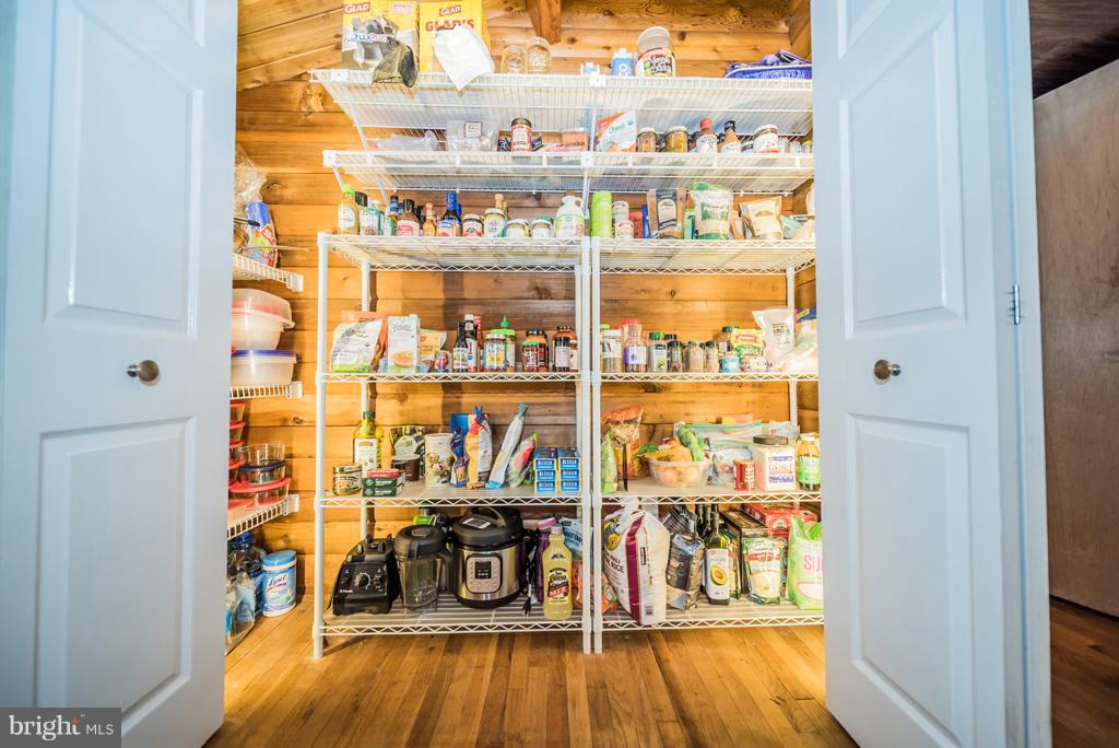 12550 Rousby Hall Road Lusby, MD 20657 - Photo 8 of 30 Walk-in Pantry well lit and perfect for storage