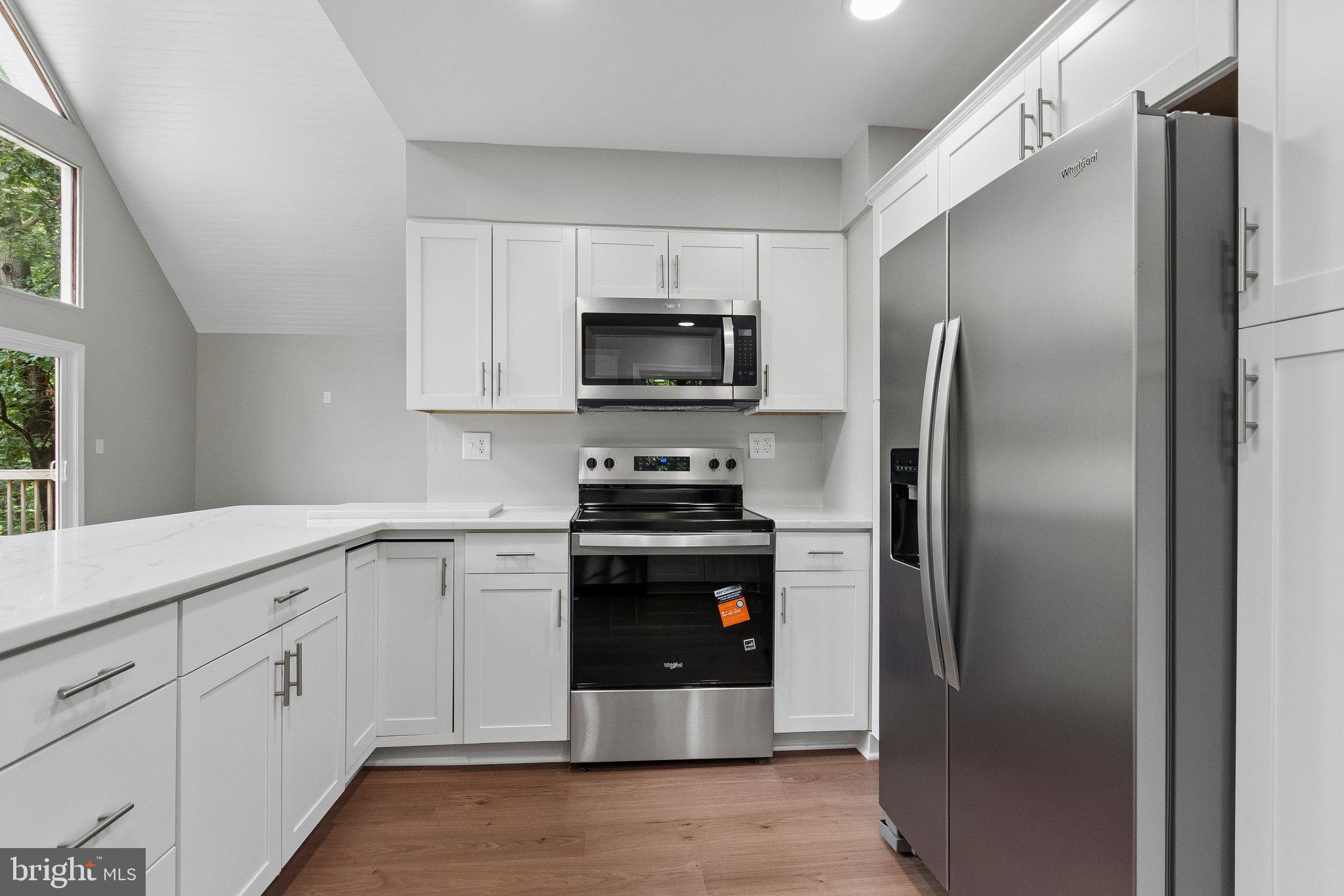 576 Manor Road Front Royal, VA 22630 - Photo 3 of 41 Modern kitchen with sleek finishes.