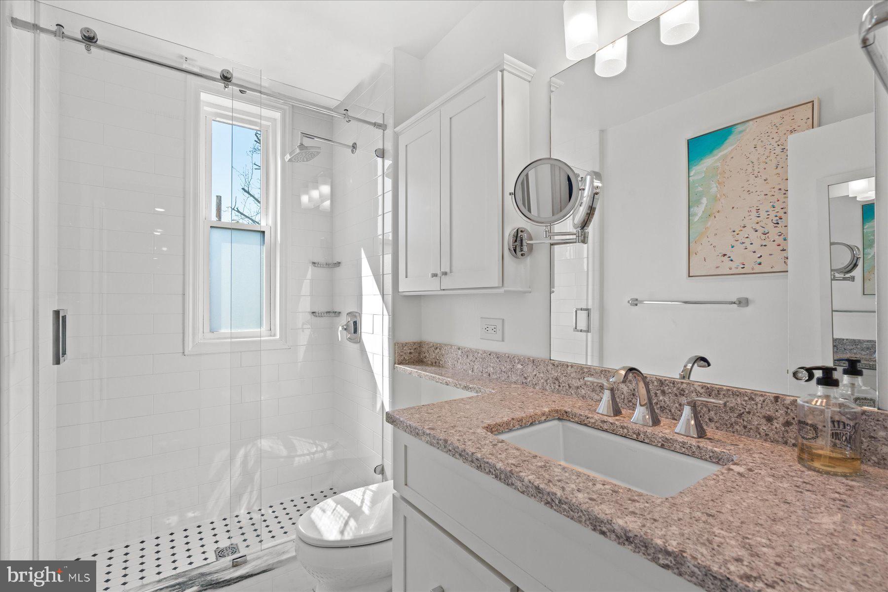 3022 R Street Northwest, Unit 1/2 Washington, DC 20007 - Photo 17 of 25 Light-filled hallway full bath