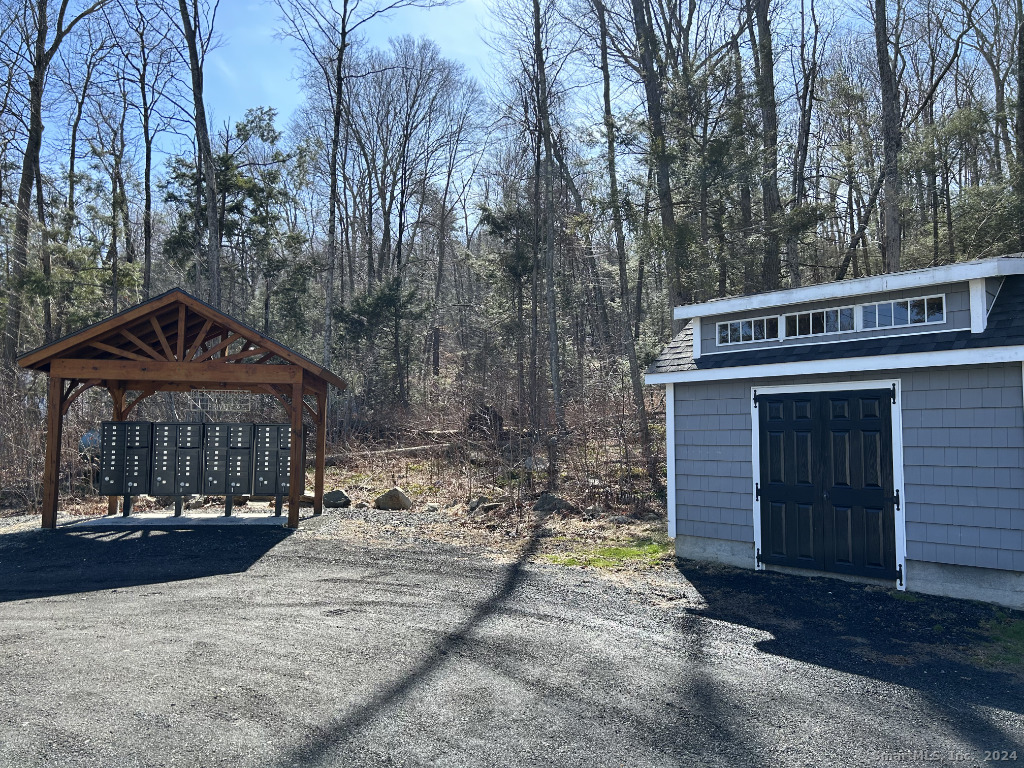 30 Cedarhurst Trail Newtown, CT 06482 - Photo 11 of 13 a view of a house with a yard