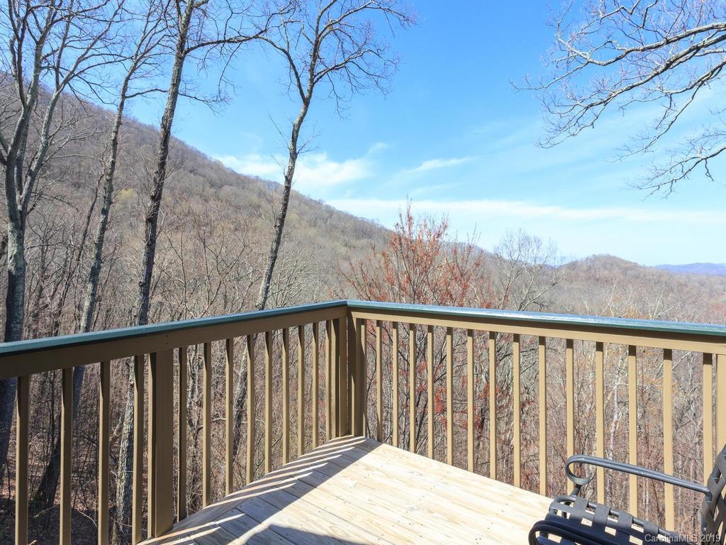 755 Andrew Banks Road Burnsville, NC 28714 - Photo 16 of 24 a view of wooden balcony with wooden fence