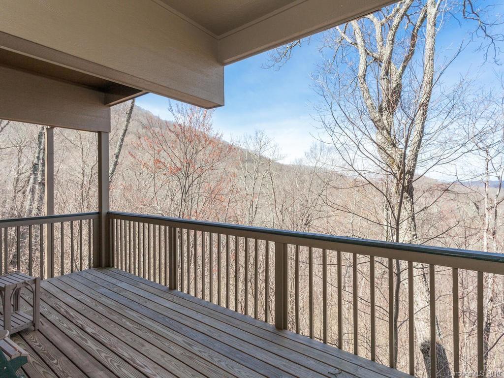 755 Andrew Banks Road Burnsville, NC 28714 - Photo 24 of 24 a view of balcony with wooden floor