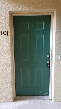 a bathroom with a shower and a sink