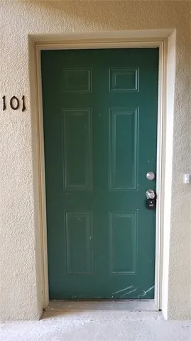 a bathroom with a shower and a sink