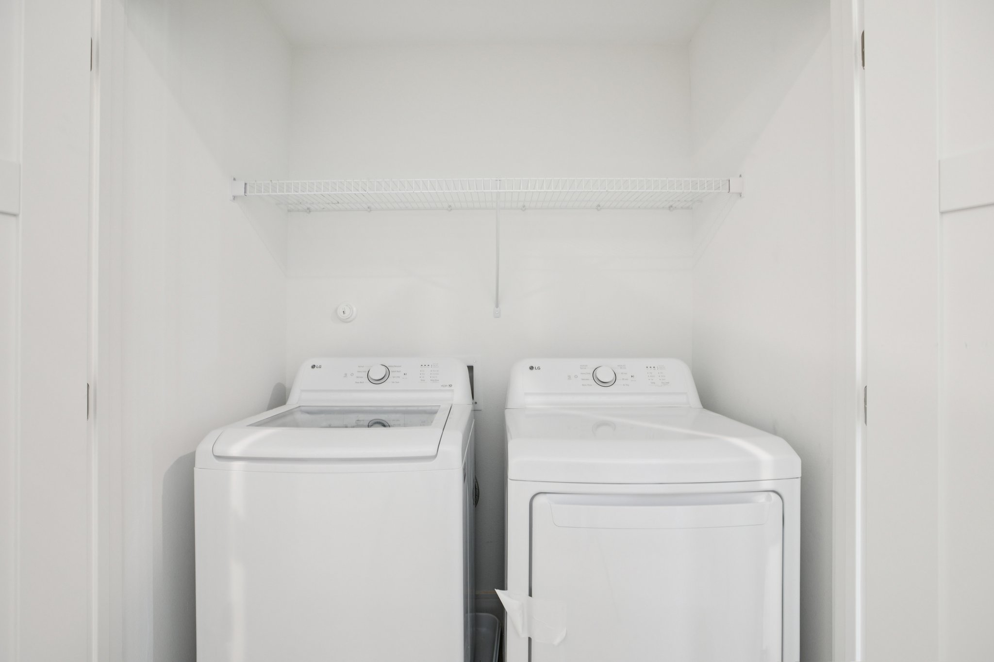 202 Tesla Circle Austin, TX 78681 - Photo 19 of 35 Laundry area with washer and dryer