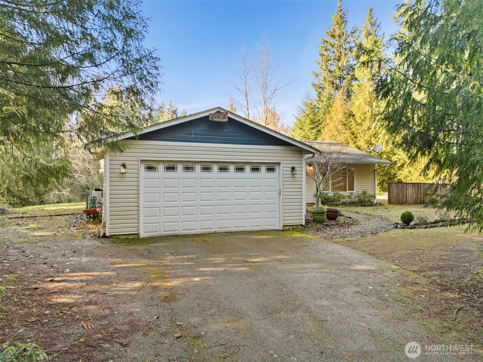 297 Lewis Road West Seabeck, WA 98380 - Photo 28 of 35 a view of a house with a yard