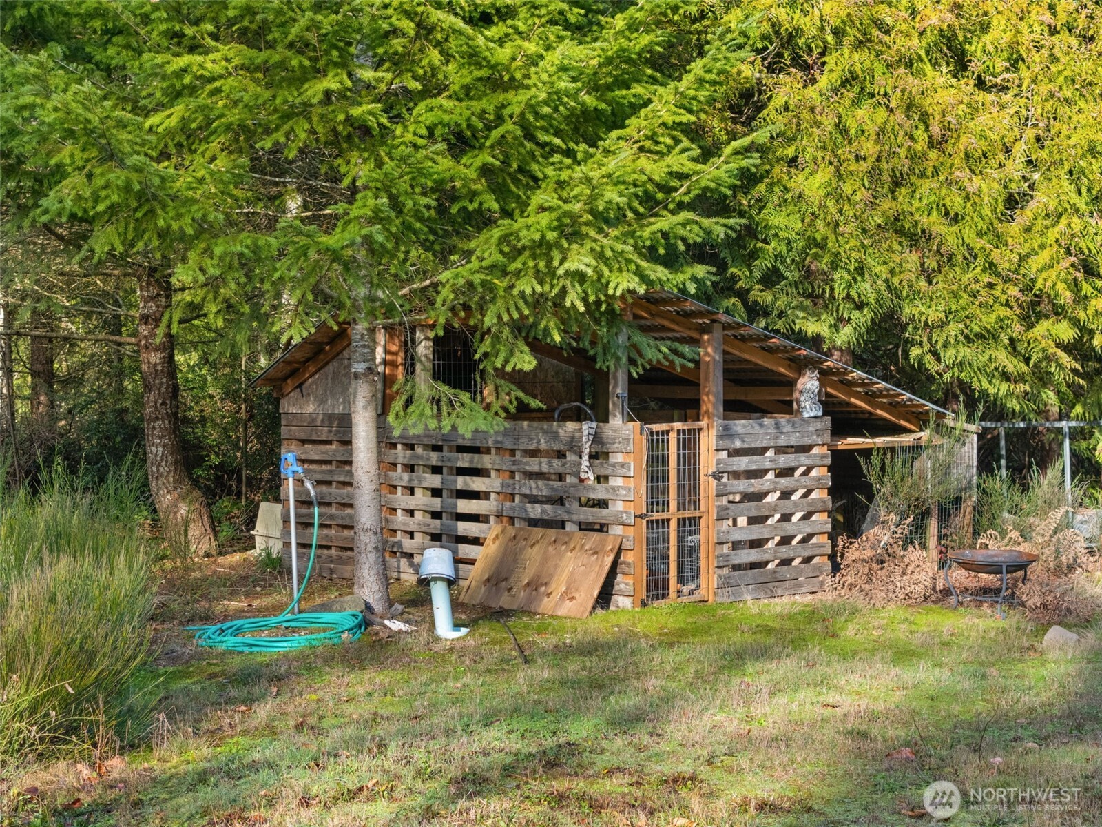 297 Lewis Road West Seabeck, WA 98380 - Photo 35 of 35 front view of a house with a yard