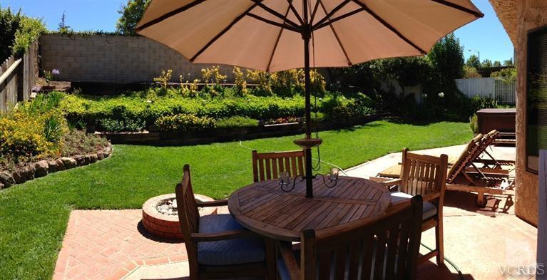 4368 Laurelhurst Road Moorpark, CA 93021 - Photo 16 of 28 a view of a table and chairs under an umbrella