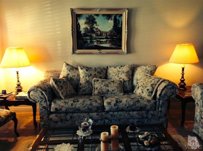 4368 Laurelhurst Road Moorpark, CA 93021 - Photo 4 of 28 a living room with furniture and a lamp