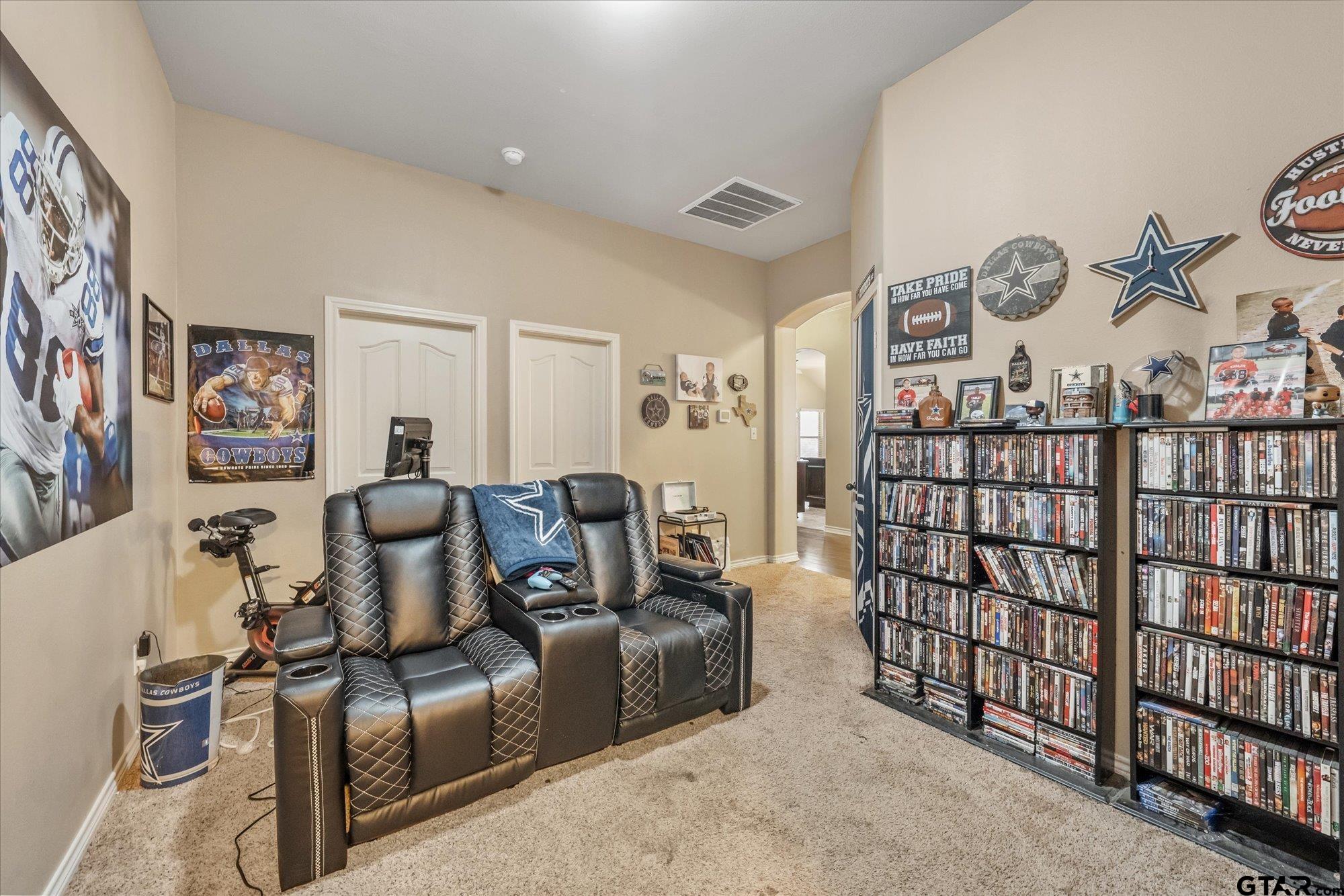 469 Cherokee Street Rusk, TX 75785 - Photo 12 of 35 a living room with furniture a wall and a painting