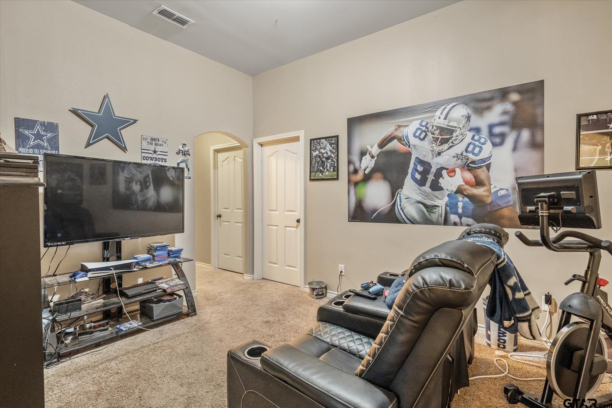 469 Cherokee Street Rusk, TX 75785 - Photo 13 of 35 a living room with furniture and a flat screen tv