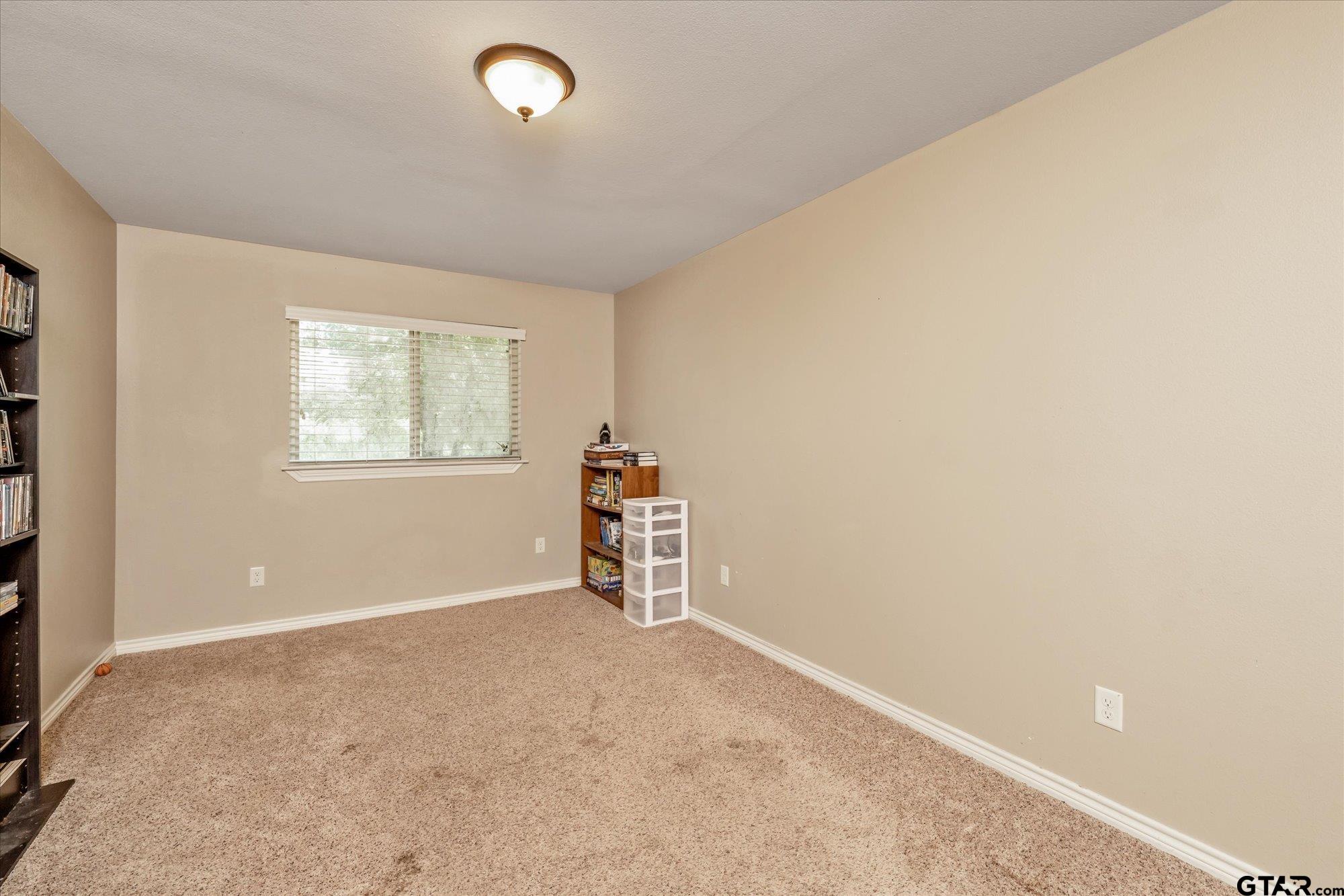 469 Cherokee Street Rusk, TX 75785 - Photo 16 of 35 an empty room with windows and closet