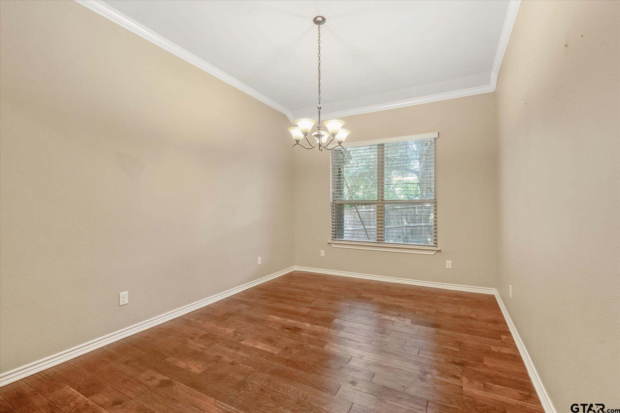 469 Cherokee Street Rusk, TX 75785 - Photo 26 of 35 a view of a room with windows and chandelier