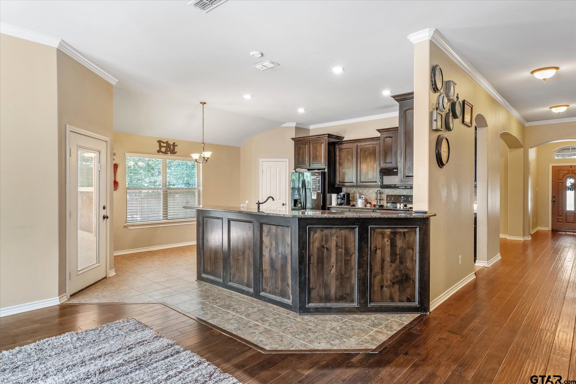 469 Cherokee Street Rusk, TX 75785 - Photo 30 of 35 a view of kitchen with furniture and wooden floor