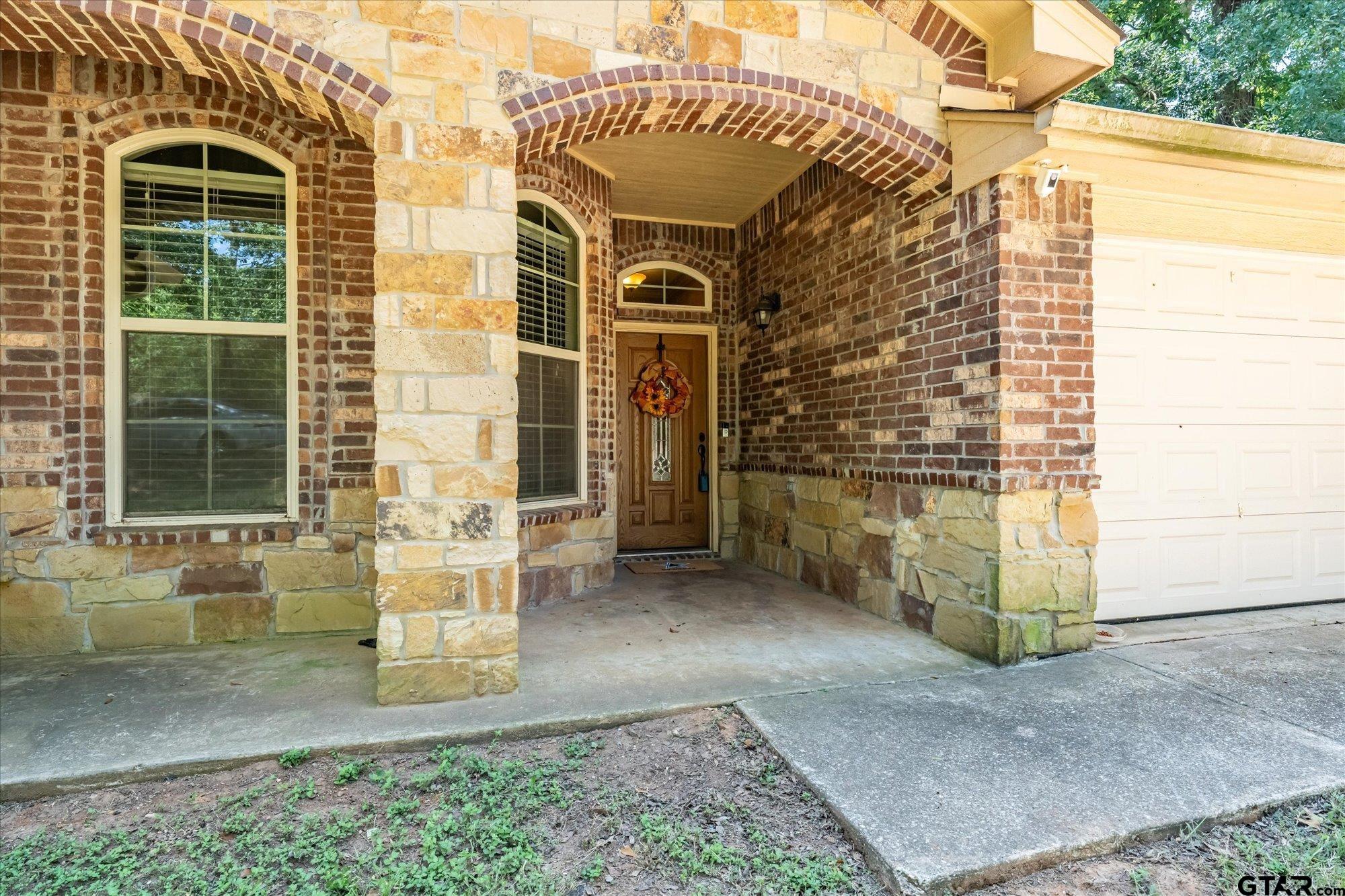 469 Cherokee Street Rusk, TX 75785 - Photo 6 of 35 a front view of a house with a yard