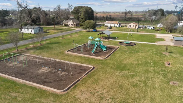 a view of a building with a yard
