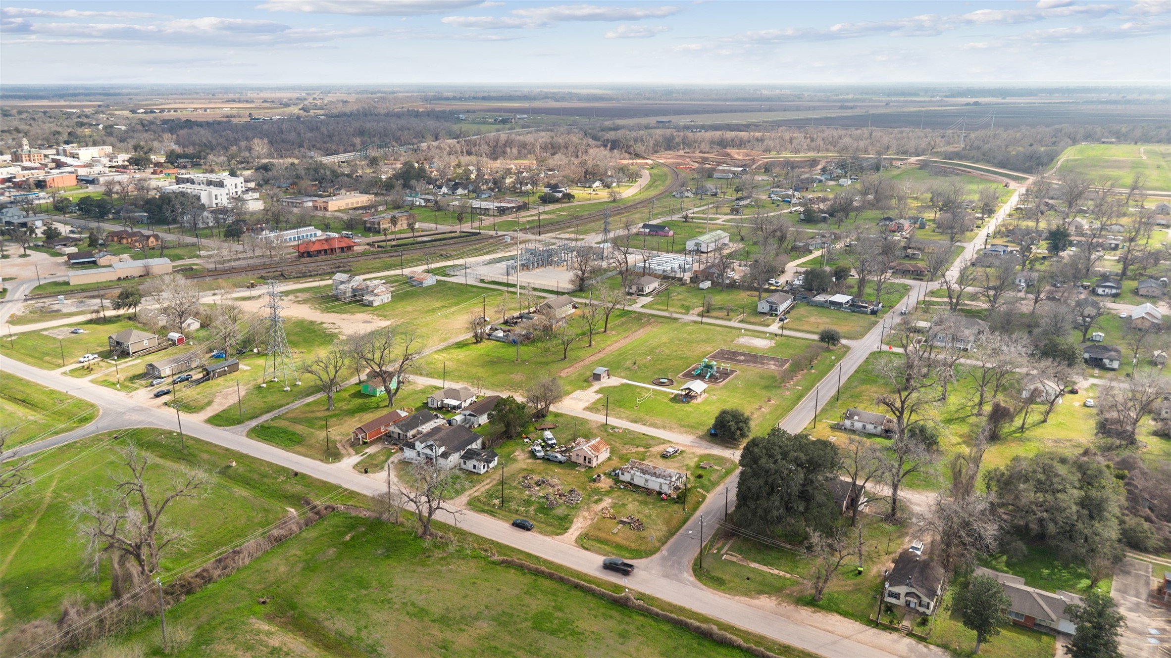 929 West Spanish Camp Road Wharton, TX 77488 - Photo 9 of 23 an aerial view of residential houses with outdoor space