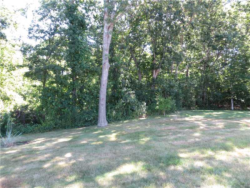 89 Quannacut Road, Unit 89B Westerly, RI 02891 - Photo 14 of 25 Exterior Back. Back Yard